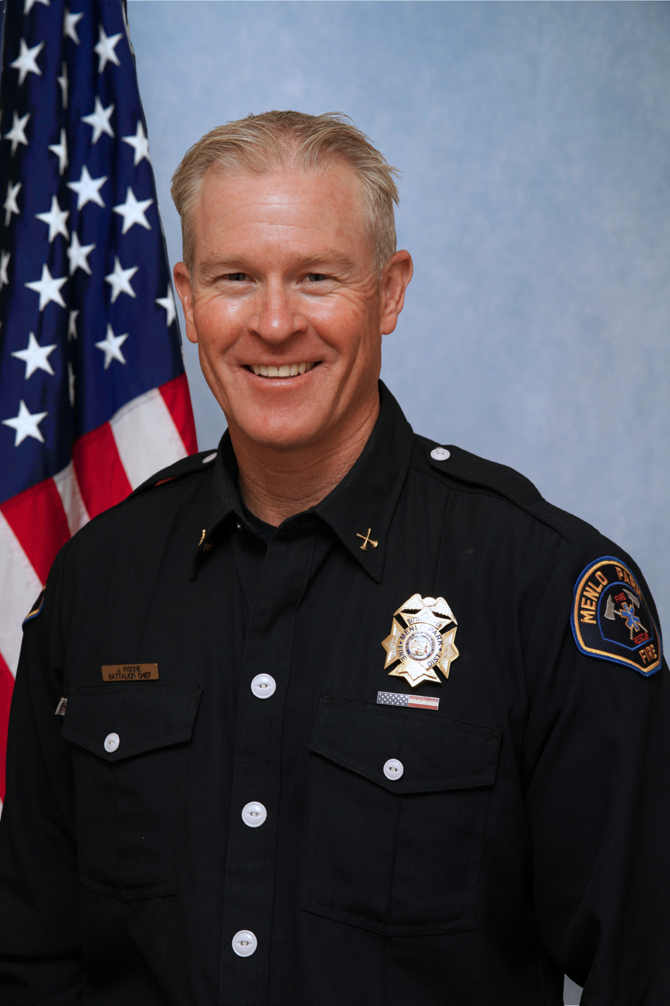 Portrait of Joey Figone, smiling.